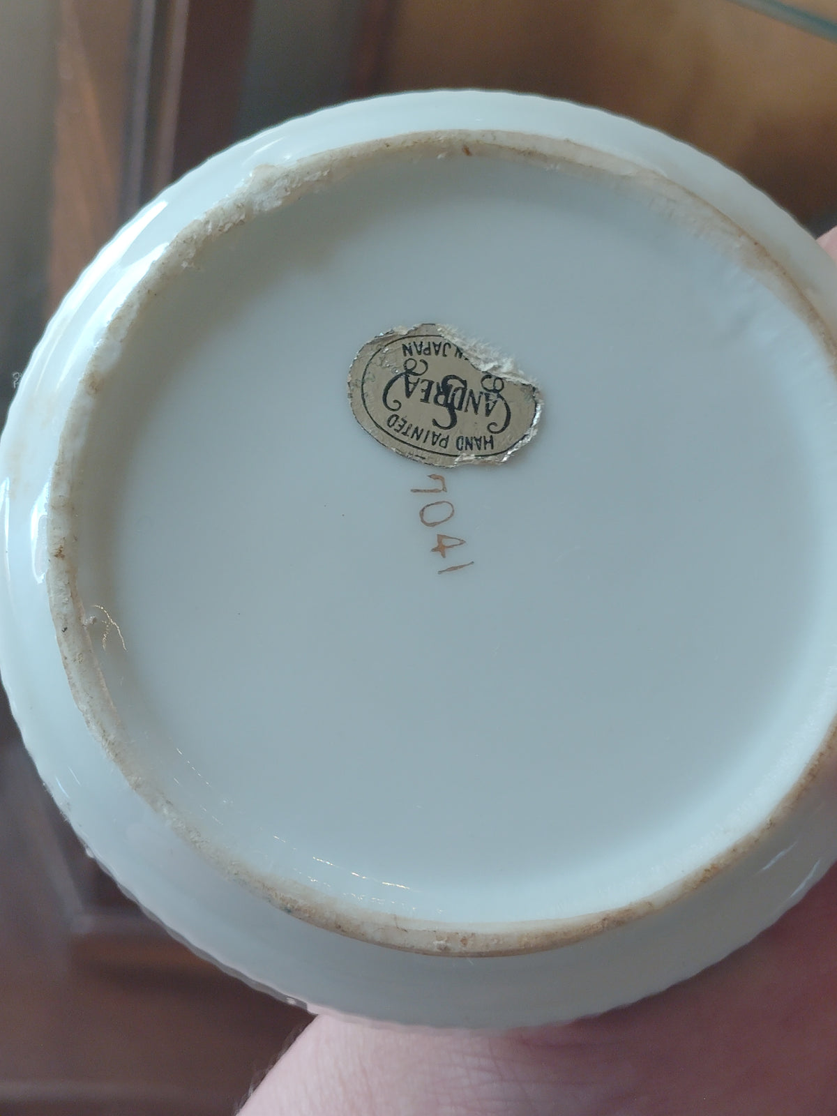 antique porcelain coasters in carry cage